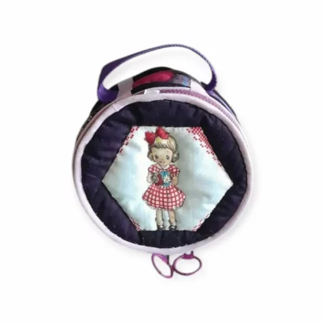 Trousse cylindrique violette dessus