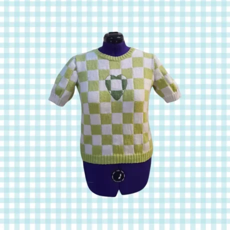 Jumper vert à damier avec un cœur face